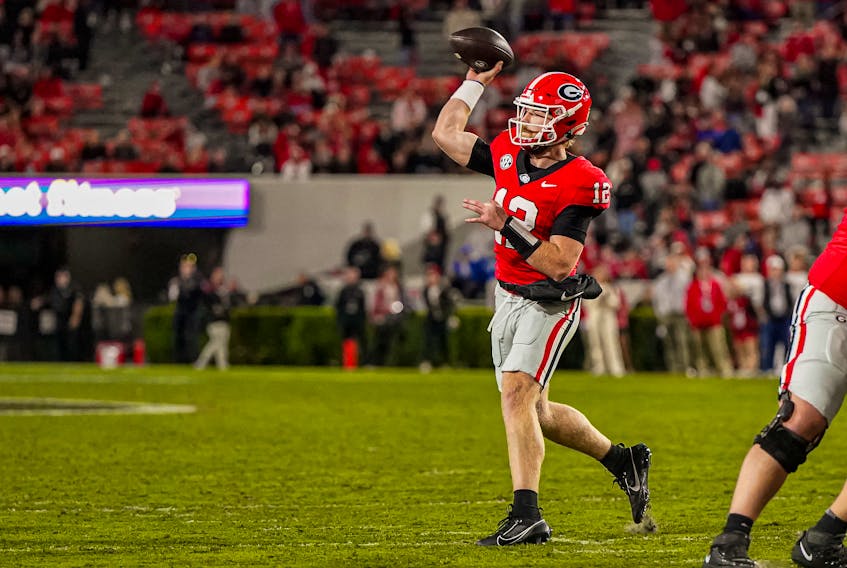 Oct 7, 2023; Athens, Georgia, USA; Georgia Bulldogs quarterback Brock Vandagriff (12) passes for a touchdown against the Kentucky Wildcats during the second half at Sanford Stadium. Mandatory Credit: Dale Zanine-USA TODAY Sports/File Photo