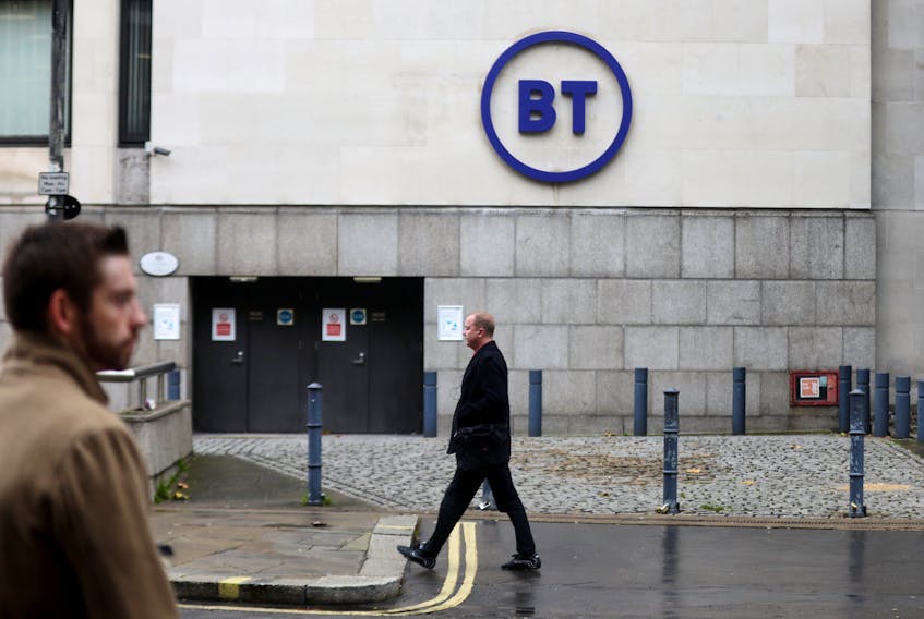 People walk past British Telecom (BT) headquarters in London, Britain, November 15, 2019.