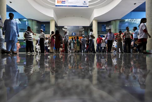 Patients and their attendants are seen inside Apollo hospital in New Delhi, India, September 8, 2015. Picture taken September 8, 2015.