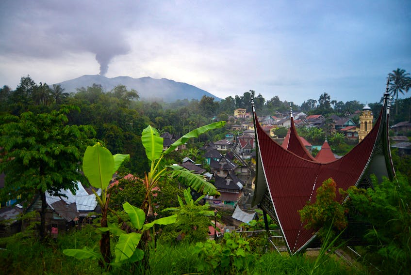 Mount Marapi volcano spews volcanic ash as seen from Pariangan in Tanah Datar, West Sumatra province, Indonesia, December 6, 2023, in this photo taken by Antara Foto. Antara Foto/Iggoy el Fitra/ via REUTERS