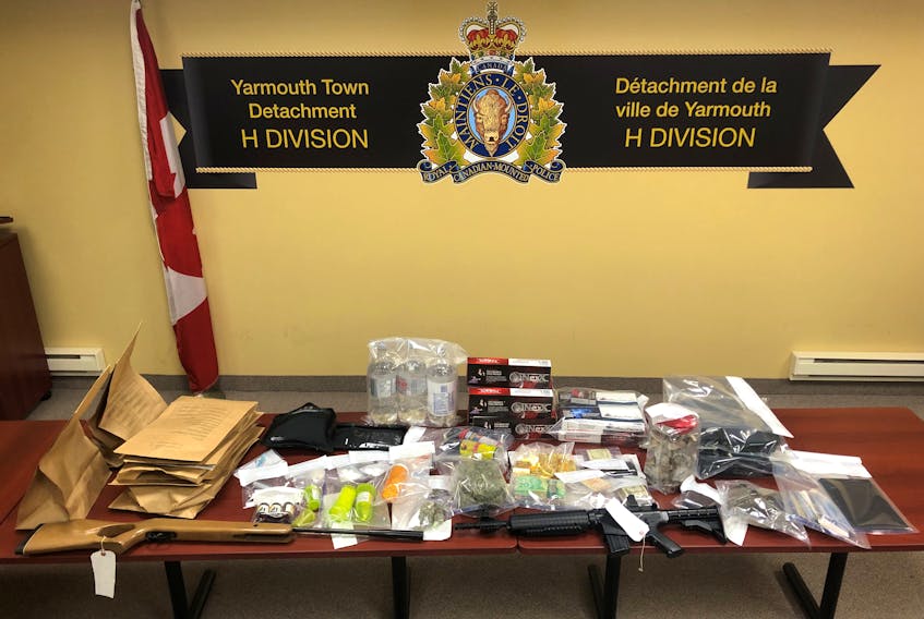 RCMP seized some cocaine, electronic devices, counterfeit bills, firearms and items of what police believed to be child pornography evidence during the Yarmouth home search on Tuesday, Dec. 5. - Contributed