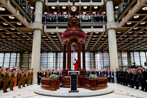 A Lloyd's waiter rings the Lutine Bell during an event to mark accession of Britain's King Charles at the Lloyd's Building in the City of London, Britain, September 15, 2022.