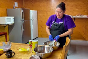Thirty-eight-year-old mother Stephanie Christmas of Eskasoni works full-time as a continuing care assistant and spends weekends cooking dinners in her "cookhouse" to sell to her community. MITCHELL FERGUSON/CAPE BRETON POST