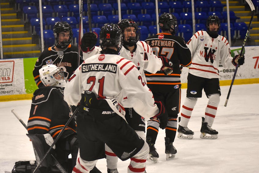 Veteran Keiran Sears begins to celebrate one of his three  first-period goals on Sunday as he recorded a natural hat-trick and  started Pictou County on its way to win over the Cape Breton West  Islanders. Richard MacKenzie