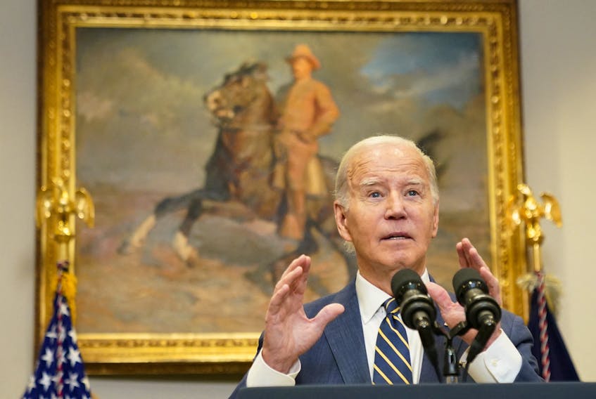 U.S. President Joe Biden gestures as he delivers remarks on aid to Ukraine from the White House in Washington, U.S., December 6, 2023.