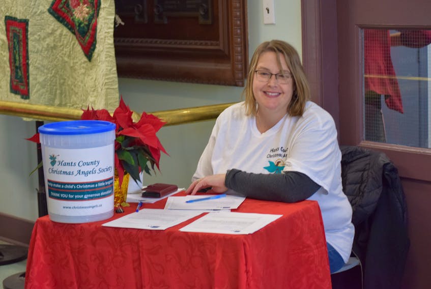Joanne O’Leary, from Martock, greeted performers and spectators of the Hants County Christmas Angels webathon as they entered the community centre in Windsor. She volunteered to direct people to the right location and register them for the show.