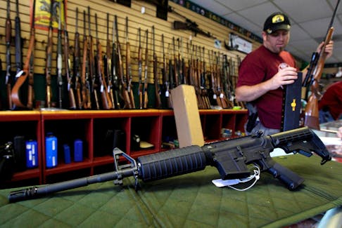 A Palmetto M4 assault rifle is seen at the Rocky Mountain Guns and Ammo store in Parker, Colorado July 24, 2012. 