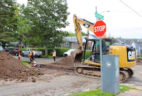 Brilun Construction workers performing road and water upgrades on the corner of Atlantic and Garden streets in Sydney’s Ashby neighbourhood. Developers in Cape Breton Regional Municipality said pre-construction red tape such as permits, inspections and other bylaws are delaying how quickly needed developments such as housing can be built. MITCHELL FERGUSON/CAPE BRETON POST
