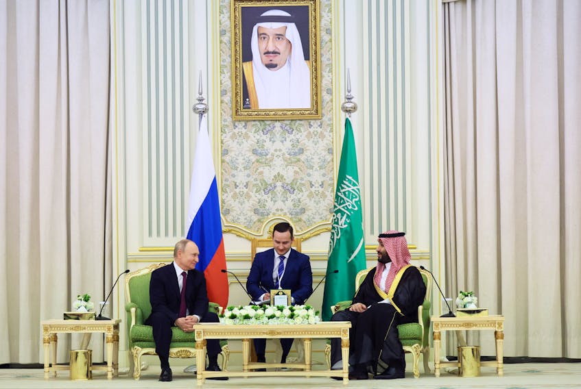 Russian President Vladimir Putin and Saudi Crown Prince Mohammed bin Salman attend a meeting in Riyadh, Saudi Arabia December 6, 2023. Sputnik/Sergei Savostyanov/Pool via