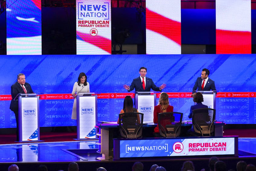 Former New Jersey Governor Chris Christie, former U.S. Ambassador to the United Nations Nikki Haley, Florida Governor Ron DeSantis and Republican presidential candidate and businessman Vivek Ramaswamy participate in the fourth Republican candidates' debate of the 2024 U.S. presidential campaign hosted by NewsNation at the University of Alabama in Tuscaloosa, Alabama, U.S. December 6, 2023.
