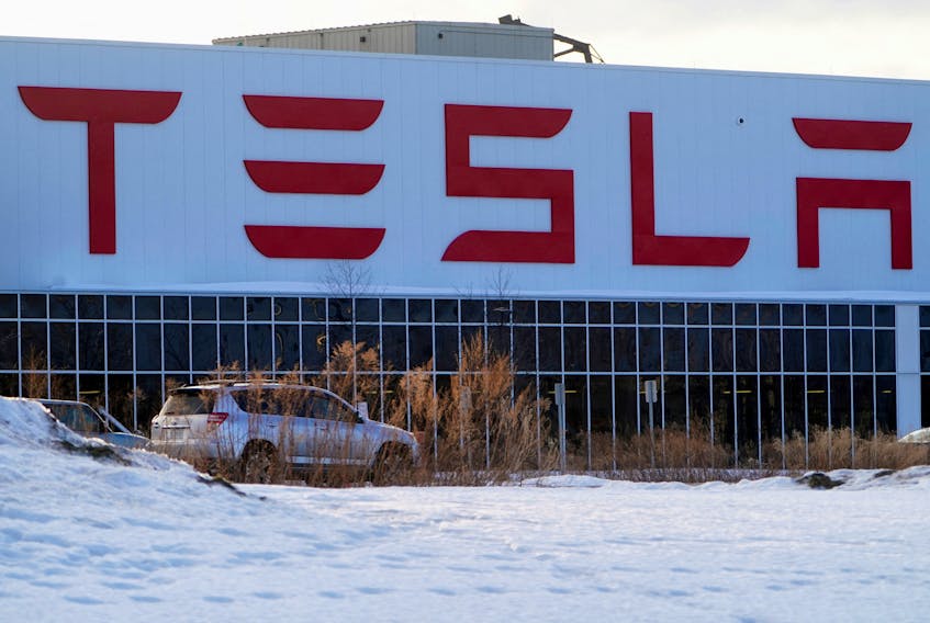A Tesla sign is pictured outside the Tesla Gigafactory 2 in Buffalo, New York, U.S., February 13, 2022.