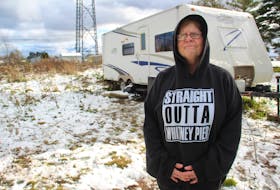 Shannon Dornadic stands outside the recreational vehicle she moved into in August, unable to find affordable housing appropriate to her needs. NICOLE SULLIVAN/CAPE BRETON POST