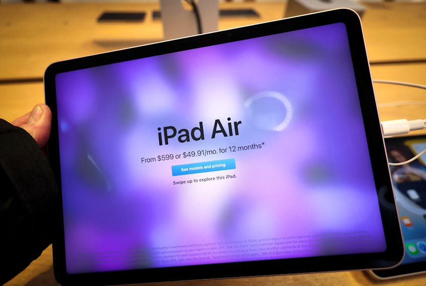 The new Apple iPad Air tablet is displayed shortly after it went on sale at the Apple Store on 5th Avenue in Manhattan, in New York City, New York, U.S., March 18, 2022.