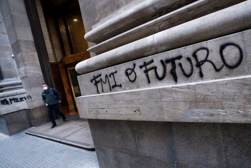 A graffiti reads “IMF or future” outside Argentina’s Banco Nacion (National Bank) in Buenos Aires’ financial district, Argentina, July 4, 2022.