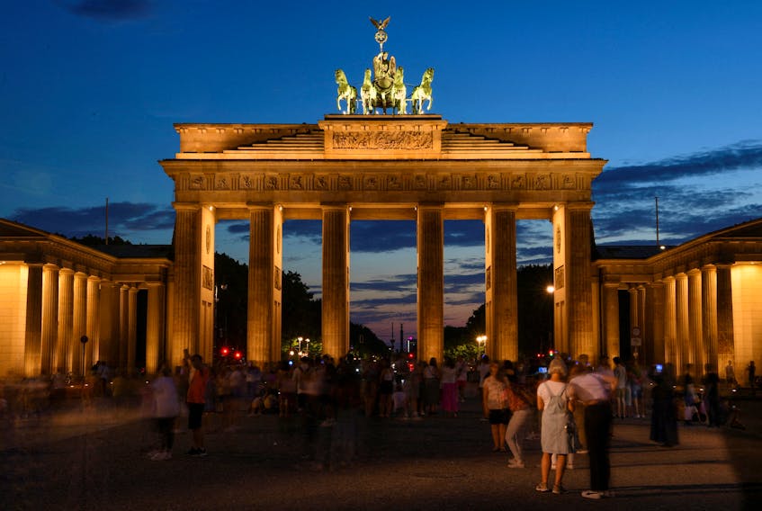 A general view of the illuminated Brandenburg Gate is pictured during the night in Berlin, Germany. August 3, 2022.