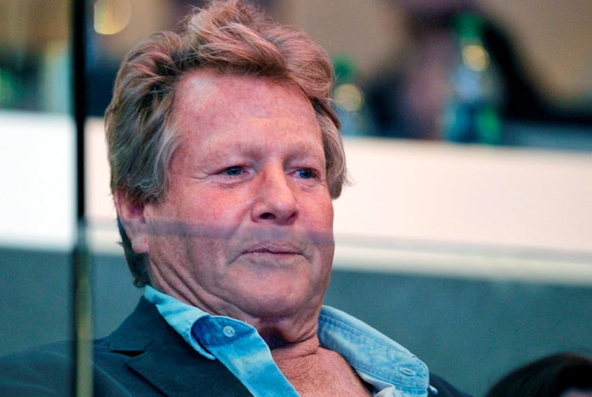 Actor Ryan O'Neal watches the Los Angeles Kings play the Vancouver Canucks during Game 4 of their NHL Western Conference Hockey playoff quarter-finals in Los Angeles, California April 18, 2012.