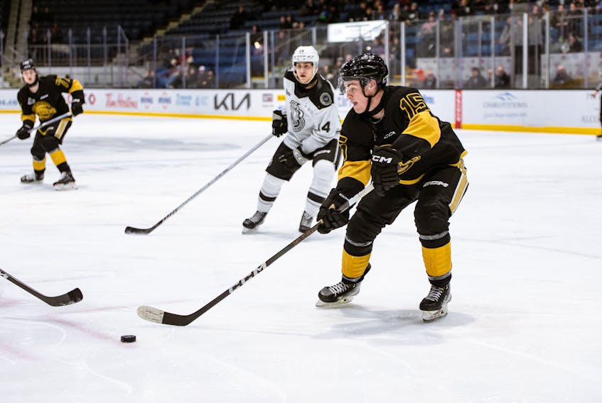 Charlottetown Islanders forward Ross Campbell, 15, makes a pass during a Quebec Major Junior Hockey League (QMJHL) game against the Gatineau Olympiques at Eastlink Centre in Charlottetown on Dec. 7. Campbell, from Souris, recorded four points and was named the game’s second star in the Islanders’ 7-4 win. Charlottetown Islanders Photo • Special to The Guardian