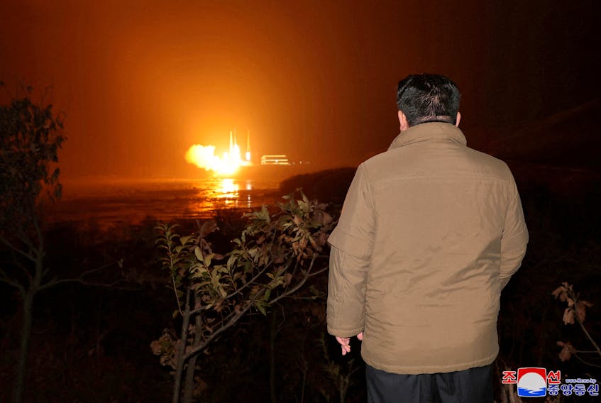 North Korean leader Kim Jong Un looks on as a rocket carrying a spy satellite Malligyong-1 is launched, as North Korean government claims, in a location given as North Gyeongsang Province, North Korea in this handout picture obtained by Reuters on November 21, 2023/ File Photo