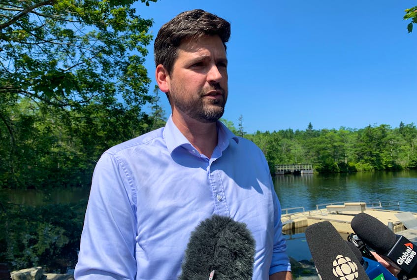Sean Fraser, the federal immigration minister and Central Nova MP, speaks at a news conference on the polluting pricing rebate at Shubie Park in Dartmouth on Thursday, July 6, 2023.