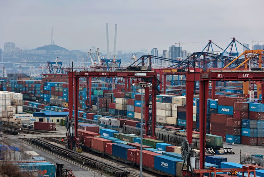 Shipping containers are stored at a commercial port in Vladivostok, Russia April 6, 2023.