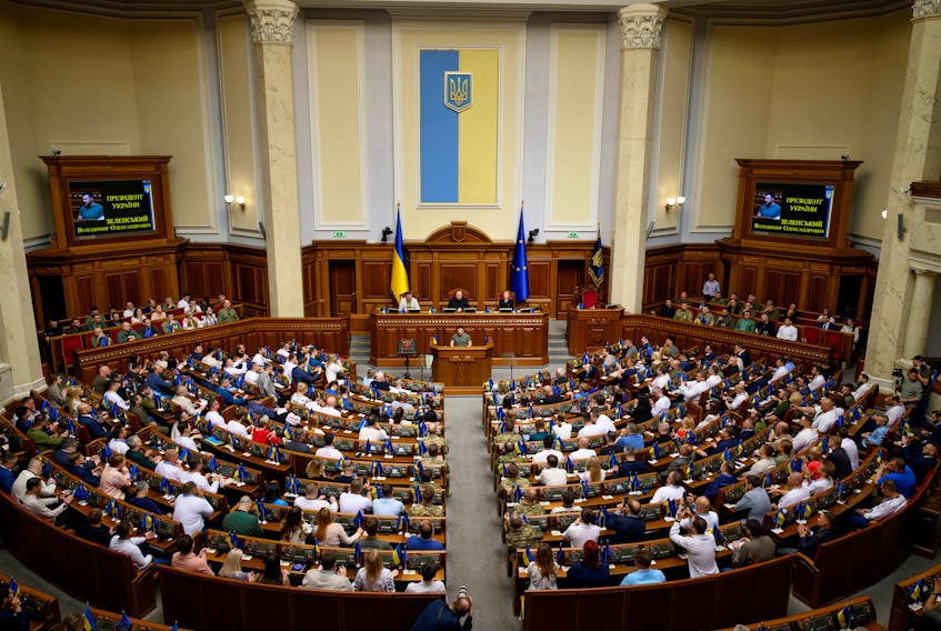 Ukraine's President Volodymyr Zelenskiy addresses lawmakers during a session of the Ukrainian parliament dedicated the Constitution Day, amid Russia's attack on Ukraine, in Kyiv, Ukraine June 28, 2023. Ukrainian Presidential Press Service/Handout via