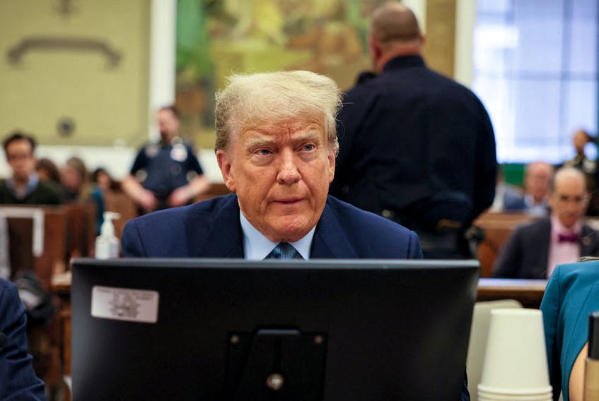 Former U.S. President Donald Trump attends a Manhattan courthouse trial in a civil fraud case in New York, U.S., October 18, 2023. Michael M Santiago/Pool via