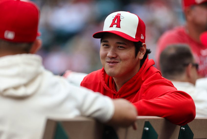 Sep 17, 2023; Anaheim, California, USA; Los Angeles Angels two-way player Shohei Ohtani (17) sits in the dugout during the MLB game against the Detroit Tigers at Angel Stadium. Kiyoshi Mio-USA TODAY Sports/File Photo