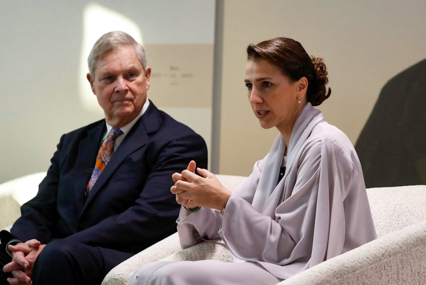 UAE Minister of Climate Change and Environment Mariam Almheiri flanked by U.S. Agriculture Secretary Tom Vilsack, speaks during an interview with Reuters, at COP28 World Climate Summit, in Dubai United Arab Emirates, December 8, 2023.