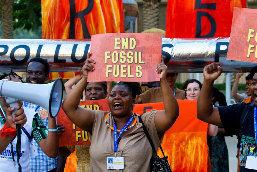 Activists participate in a demonstration against fossil fuels, during the United Nations Climate Change Conference COP28 in Dubai, United Arab Emirates, December 5, 2023.