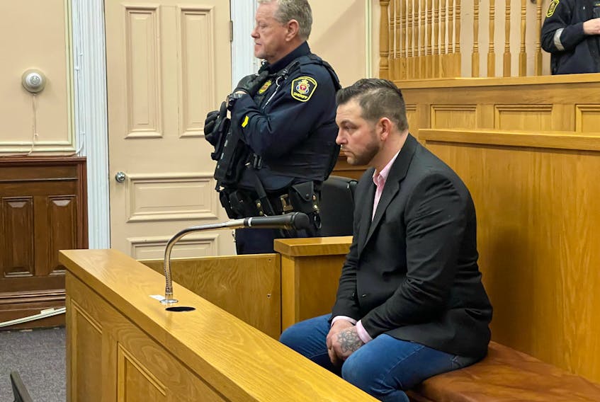 Craig Pope sits in Newfoundland and Labrador Supreme Court Friday evening, waiting for the jury to arrive with its verdict in his murder trial.