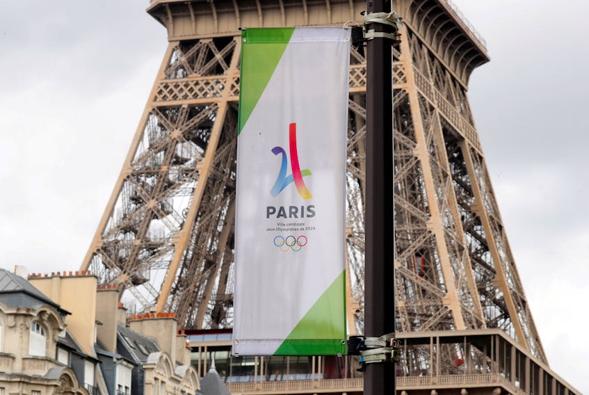 The logo of the Paris candidacy for the 2024 Olympic and Paralympic Games is seen in front the Eiffel tower in Paris, France, September 11, 2017.