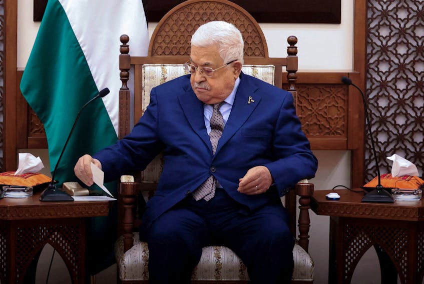 Palestinian President Mahmoud Abbas attends a meeting with Belgium's Prime Minister Alexander De Croo and Spain's Prime Minister Pedro Sanchez (not pictured), in Ramallah, 23 November 2023.  ALAA BADARNEH/Pool via