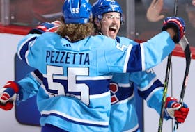 Montreal Canadiens' Rafaël Harvey-Pinard celebrates his goal with Michael Pezzetta during second period in Montreal on Jan. 26, 2023.