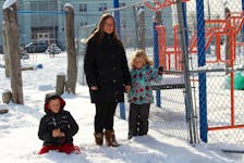 Jennifer Maher's children, Ethan and Eleanor, are among the students forbidden from playing at the Centre Scolaire Étoile de L’Acadie playground in Sydney. SHANNON LEE/CAPE BRETON POST