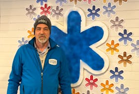 John Bennett, executive director of Harvest House Charlottetown, wears a Coldest Night toque ahead of the Coldest Night of the Year fundraisers set for Feb. 11. Jennie Pham • The Guardian