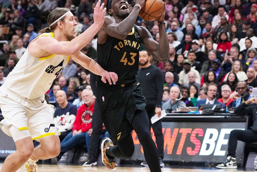 Toronto Raptors forward Pascal Siakam (43) drives to the basket as Utah Jazz forward Kelly Olynyk (41) tries to defend during the second quarter at Scotiabank Arena.