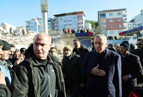 Turkish President Tayyip Erdogan meets with people in the aftermath of a deadly earthquake in Kahramanmaras, Turkey February 8, 2023. Presidential Press Office/Handout via REUTERS ATTENTION EDITORS - THIS PICTURE WAS PROVIDED BY A THIRD PARTY. NO RESALES. NO ARCHIVES.  Turkish President Tayyip Erdogan (on the right, gesturing with hand) meets with people in the aftermath of the deadly earthquake in Kahramanmaras, Turkey on Feb. 8, 2023. Presidential Press Office/Handout via REUTERS