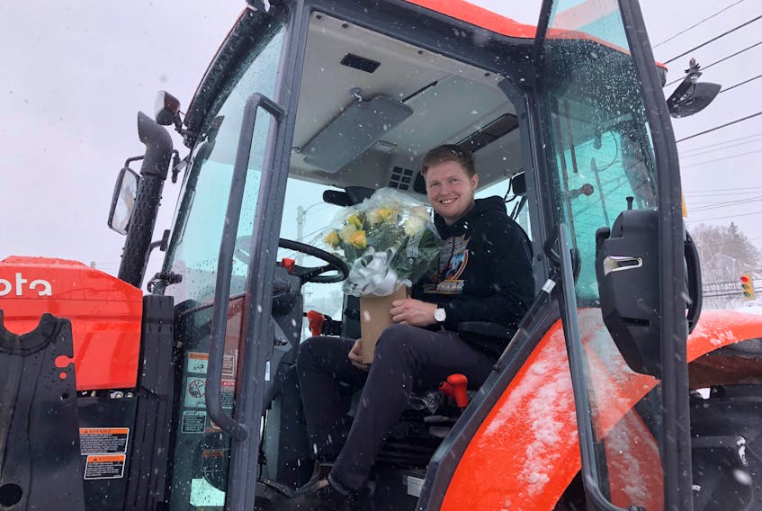 Weather was no problem for Dan MacNeil who picked up flowers for his significant other on Valentine's Day thanks to a tractor he borrowed from Keltic Kubota. MacNeil is a sales representative for the company and took the tractor out for a test drive to pick up some flowers and clear a few driveways while he was out and about. His flower shop of choice was MacKillop's Flowers in Sydney River where many others found a way to get their flowers despite the snowy conditions. Monday was extremely busy for the flower shop as people picked up flowers a day earlier to avoid the storm. GREG MCNEIL/CAPE BRETON POST
