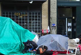 Sleeping on the street or in a shelter, as some people are doing in makeshift tent cities like this one in Vancouver’s Downtown Eastside, is the extreme public face of homelessness, but isn’t the only affordable housing issue, says columnist Janice Wells. Nick Procaylo/Postmedia News file