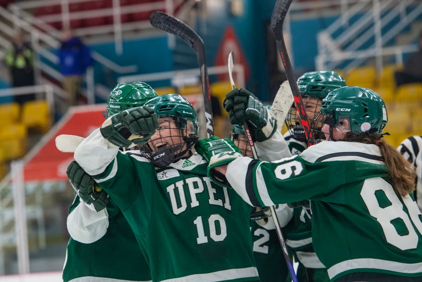 UPEI Panthers forward Taylor Gillis, 10, celebrates with teammates after scoring late in the third period of an Atlantic University Sport (AUS) Women’s Hockey Conference playoff game against the Dalhousie Tigers at MacLauchlan Arena in Charlottetown on Feb. 14. The goal by Gillis gave the Panthers a 1-0 win in the opening game of the best-of-three quarter-final series. Photo Courtesy of UPEI Athletics • Special to The Guardian