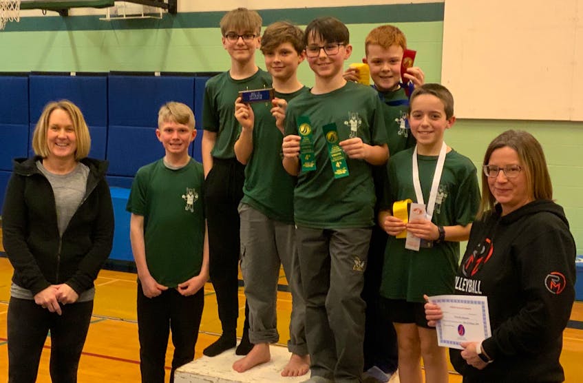 Coaches Leisa Nogler, left, and Jaime-Lynn Sutton, right, join members of the winning novice boys team from Lucy Maud Montgomery School at the P.E.I. School Athletic Association ADL Provincial Gymnastics Championship. Team members include Landon McGee-Gallant, second left, Emmett Nicholson, Jonathan MacKay, James Walsh, Colton McCaughey and Colin Waite. Contributed