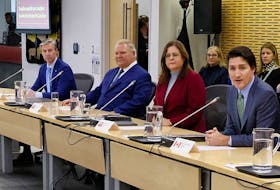 From left, premiers Tim Houston of Nova Scotia, Doug Ford of Ontario and Heidi Stefanson of Manitoba sit near Prime Minister Justin Trudeau as federal ministers, officials and others take part in a meeting with provincial and territorial premiers to discuss health care, in Ottawa on Feb. 7, 2023. - Blair Gable / Reuters