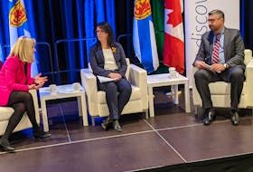 Gail Tomblin Murphy of Nova Scotia Health, Health Minister  Michelle Thompson and Andrew Shogan of the digital health company Varian chat before announcing a revamp of the province's digital system for cancer treatment. - John McPhee