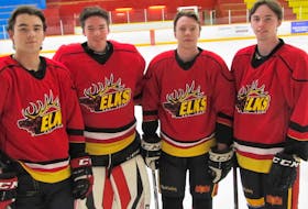 Brookfield Jr. B Elks players Dawson Blanchard (left) Pablo De Larrinaga, Mitchell King and Sam Rogers prior to a recent practice. Contributed