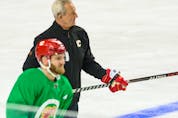  Calgary Flames head coach Darryl Sutter and Jonathan Huberdeau during team practice at Scotiabank Saddledome on Friday, February 17, 2023.