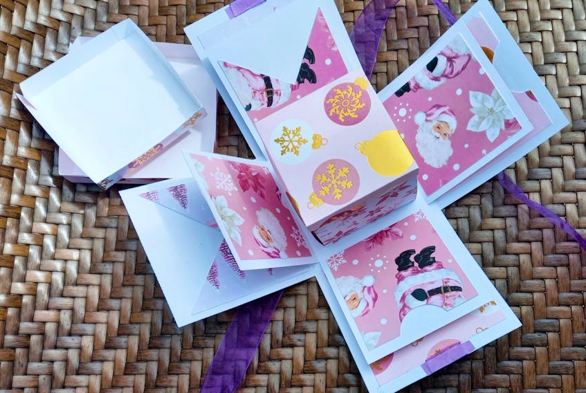 Melissa Breakwell of Sydney, N.S. uses a Cricut — a cutting machine working with online patterns — to create her Explosion Gift Boxes. Contributed photo