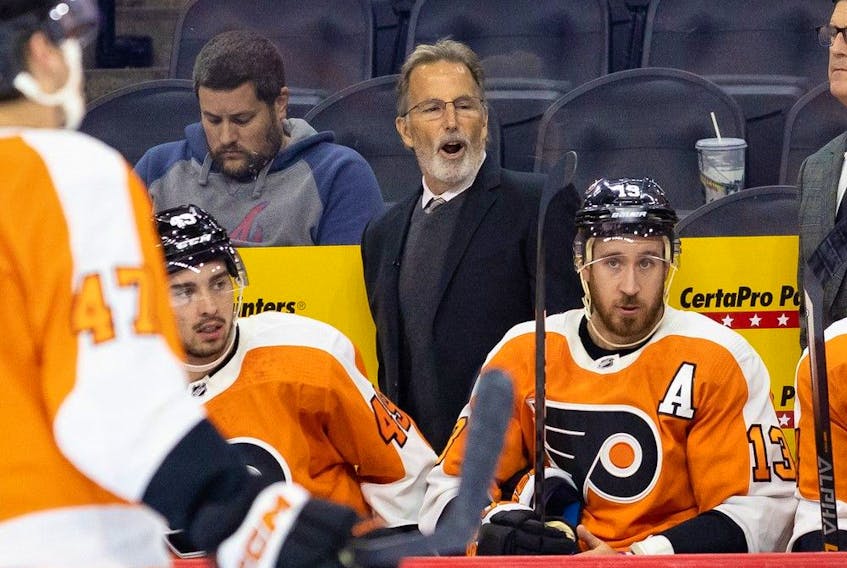 Philadelphia Flyers head coach John Tortorella talks to his players during the first period against the New York Islanders at Wells Fargo Center. 