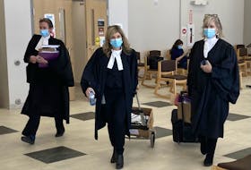 Lawyers leave Nova Scotia Supreme Court in Dartmouth on Thursday after the Crown closed its case at William Michael Sandeson's first-degree murder trial. From left are defence lawyer Alison Craig and prosecutors Carla Ball and Kim McOnie.