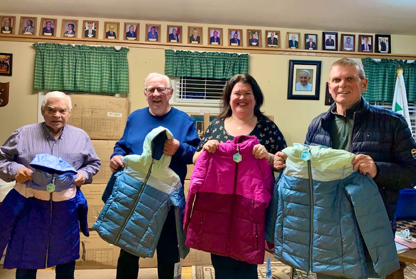 The Knights of Columbus (MSGR M.M Coady Council 9476) recently donated 120 newly purchased winter coats for children in need. The coats were distributed by The Society of St. Vincent de Paul (Our Lady of Fatima Conference). Shown, from the left, are Francis Sampson KOC, Kevin MacLellan (KOC Grand Knight)  Michelle Finigan (Conference President) and Bill Small (Conference Treasurer). CONTRIBUTED