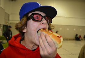 “It deliverered,” Reid Mayich, a Grade 8 student at Breton Education Centre said after trying the legendary Coal Bowl Classic hot dog. GREG MCNEIL/CAPE BRETON POST